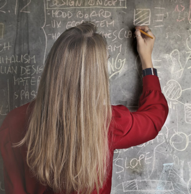 Teacher on blackboard